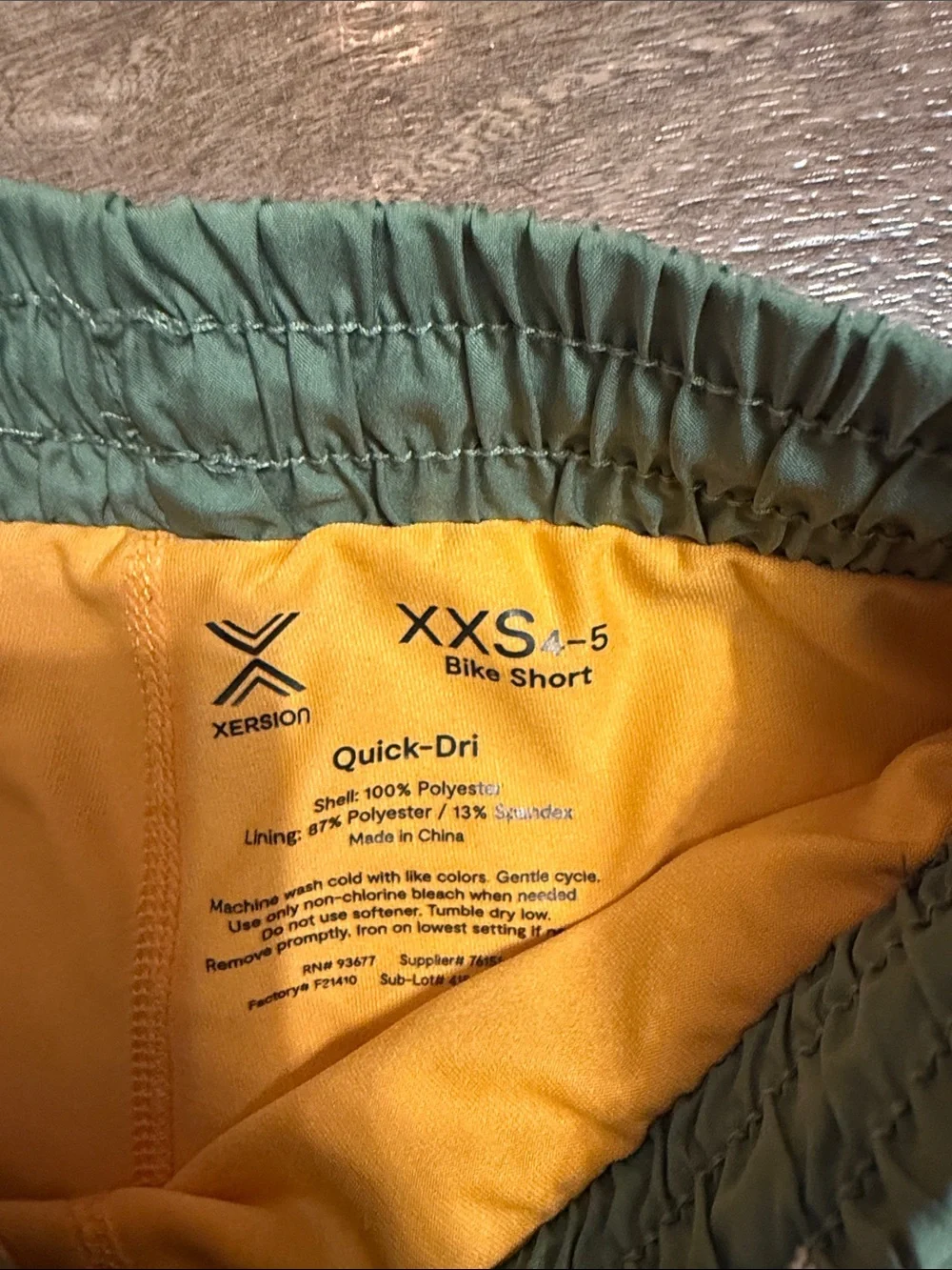 Xersion Green Athletic Shorts with Yellow Inner Liner